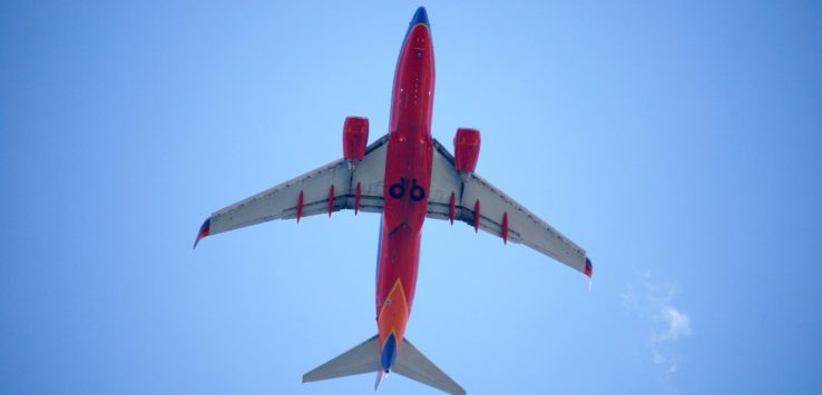 an airplane flying in the sky