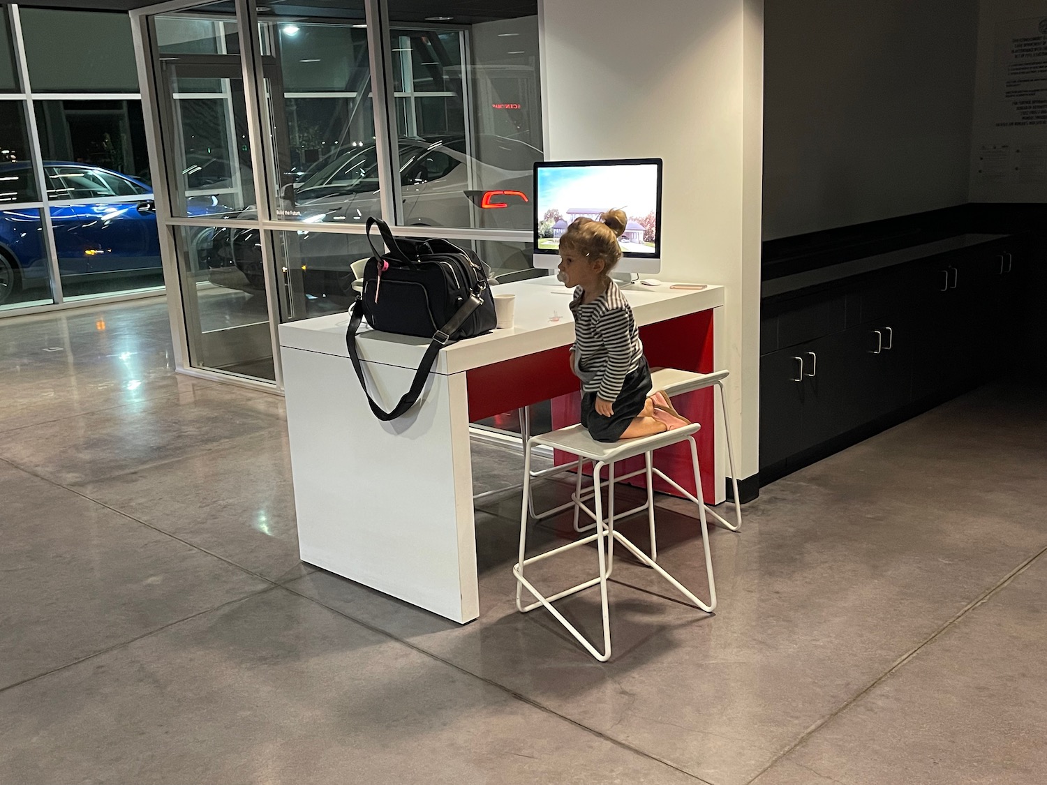 a girl sitting at a desk