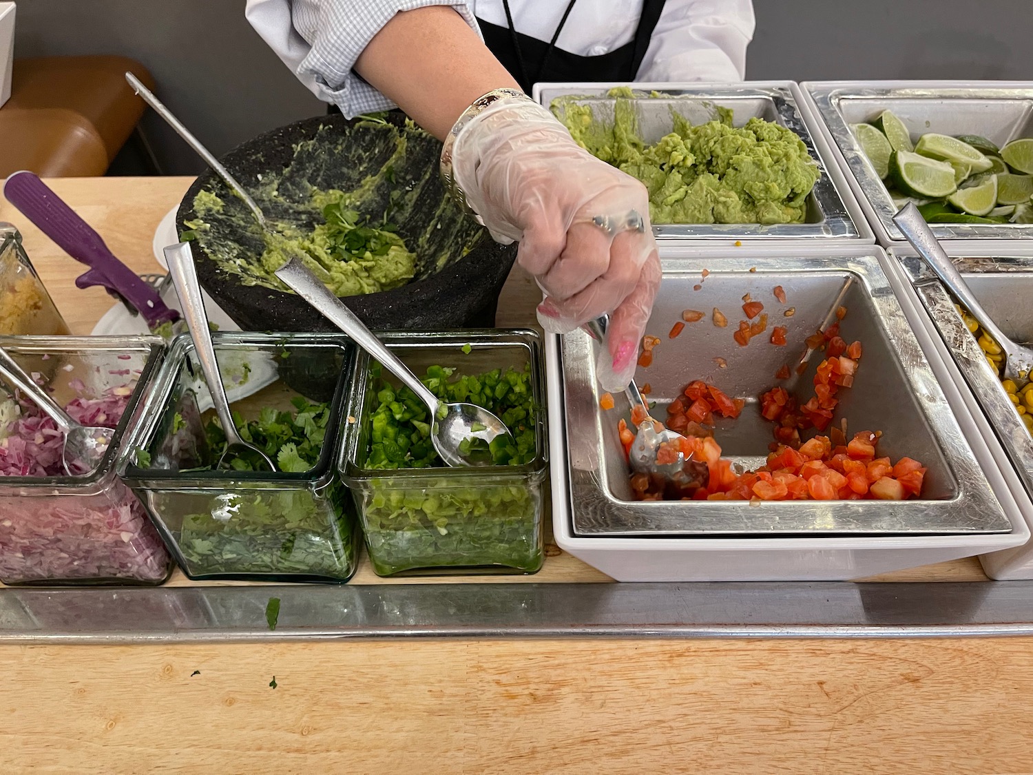 a person putting food in a bowl