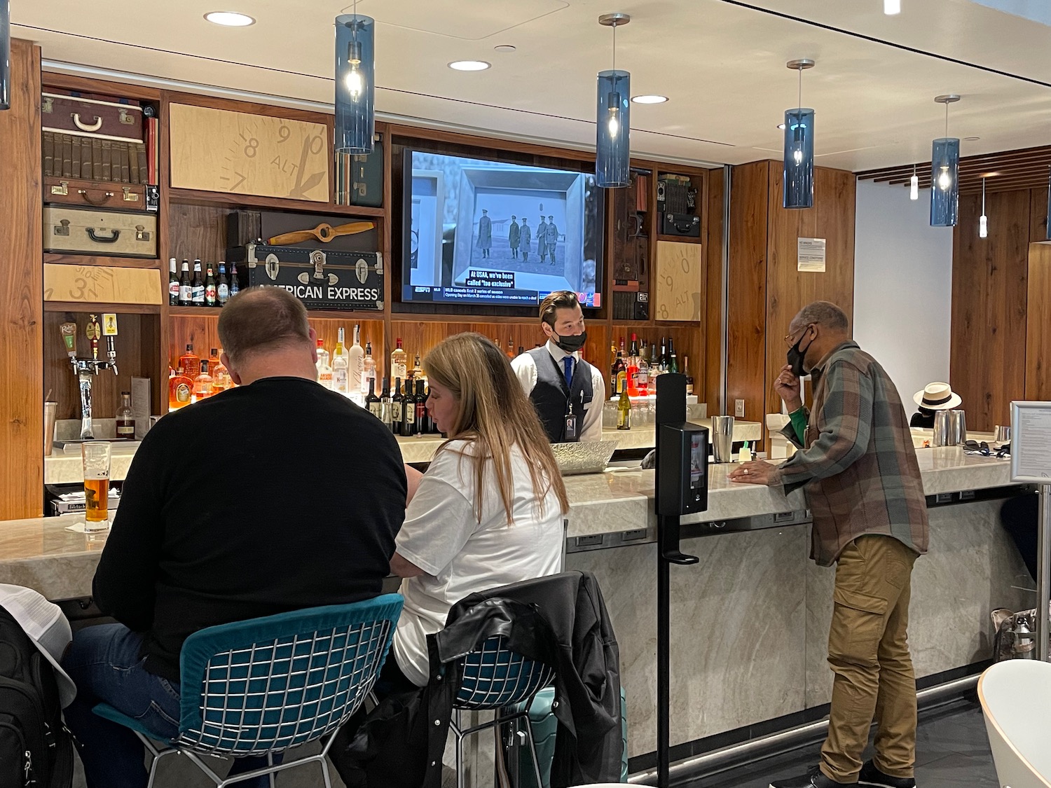 a group of people at a bar