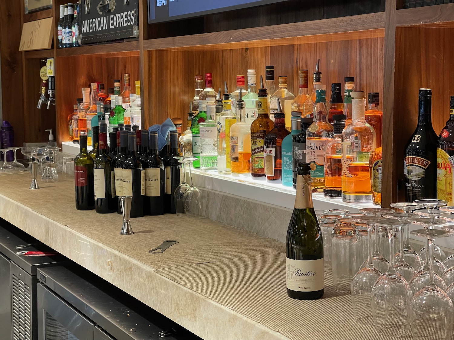 a bar with bottles of alcohol