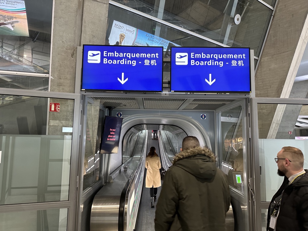 CDG Terminal 1 glass tube escalators to departure gates