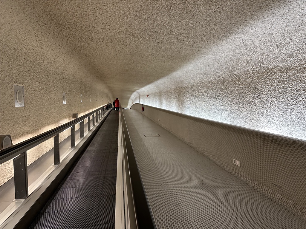 CDG Terminal 1 tiled hallway people mover