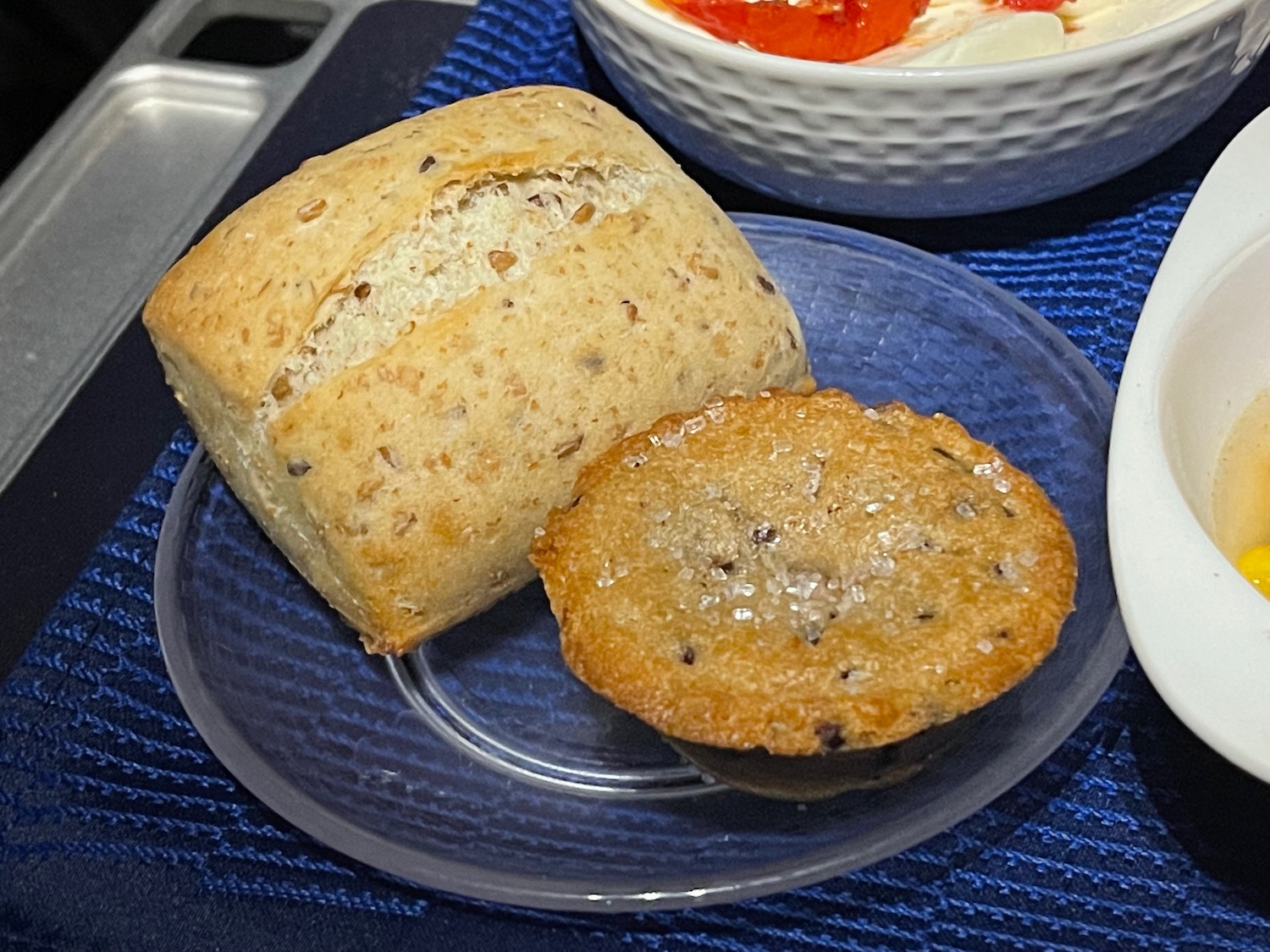 a plate of food on a blue place mat