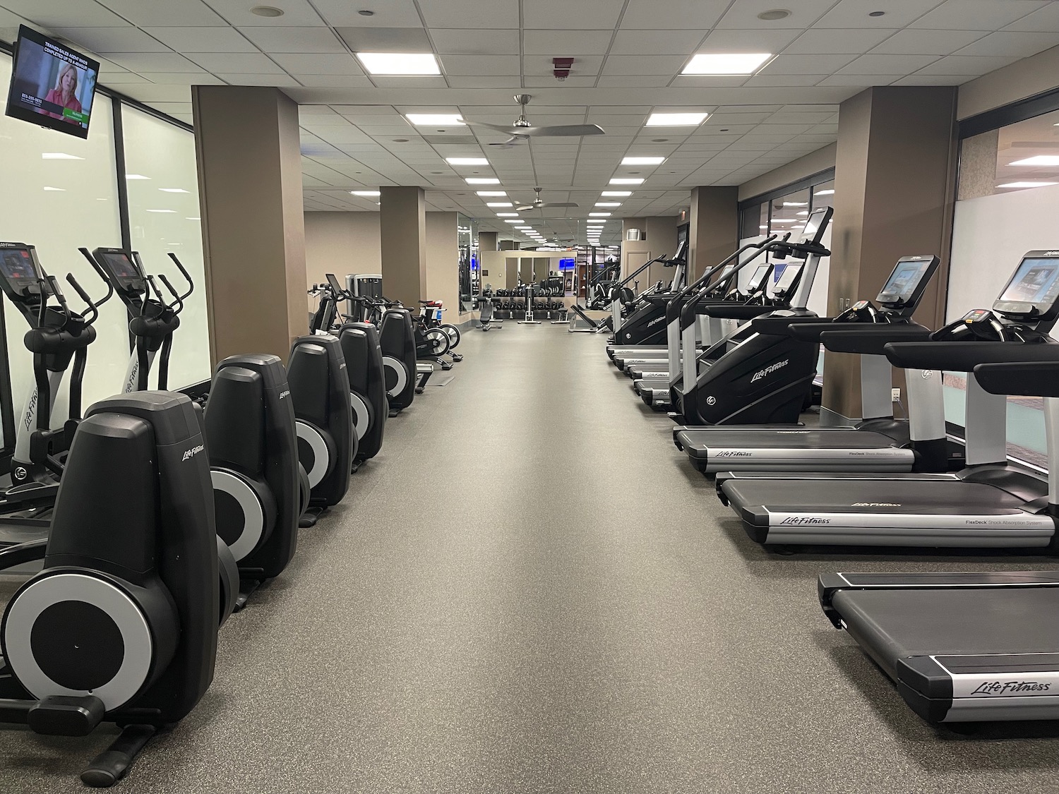 a room with treadmills and exercise machines