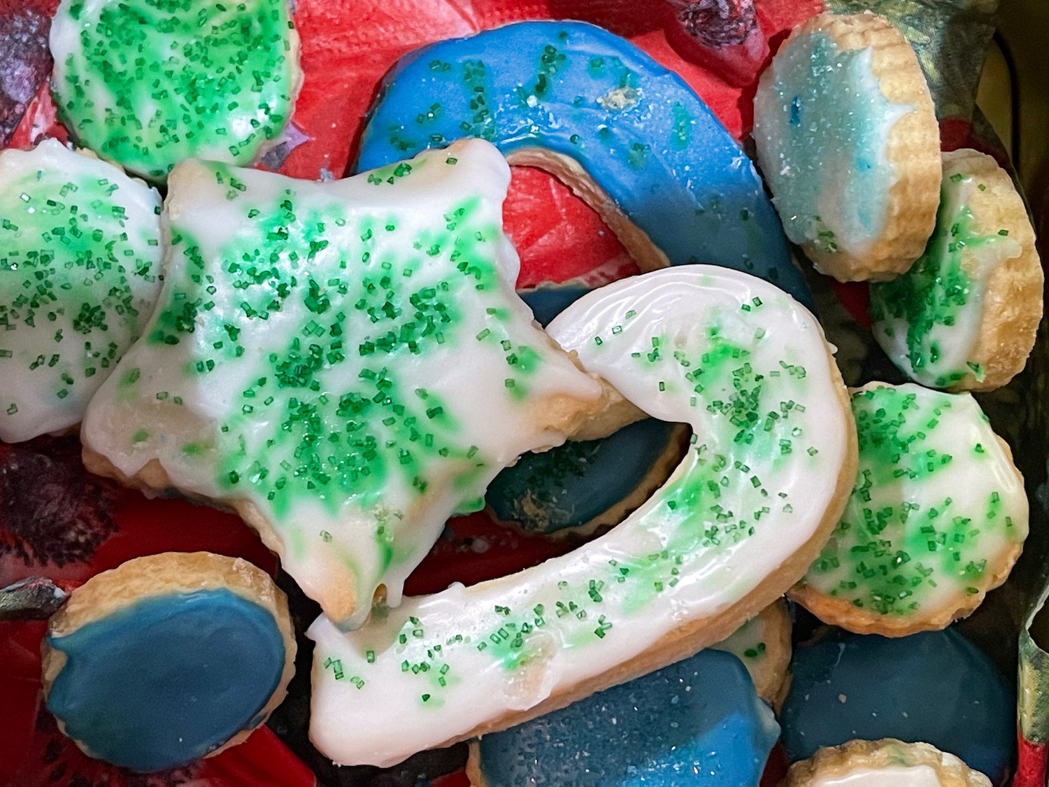 a pile of cookies with frosting