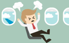 a cartoon of a man sitting in a chair with his arms up