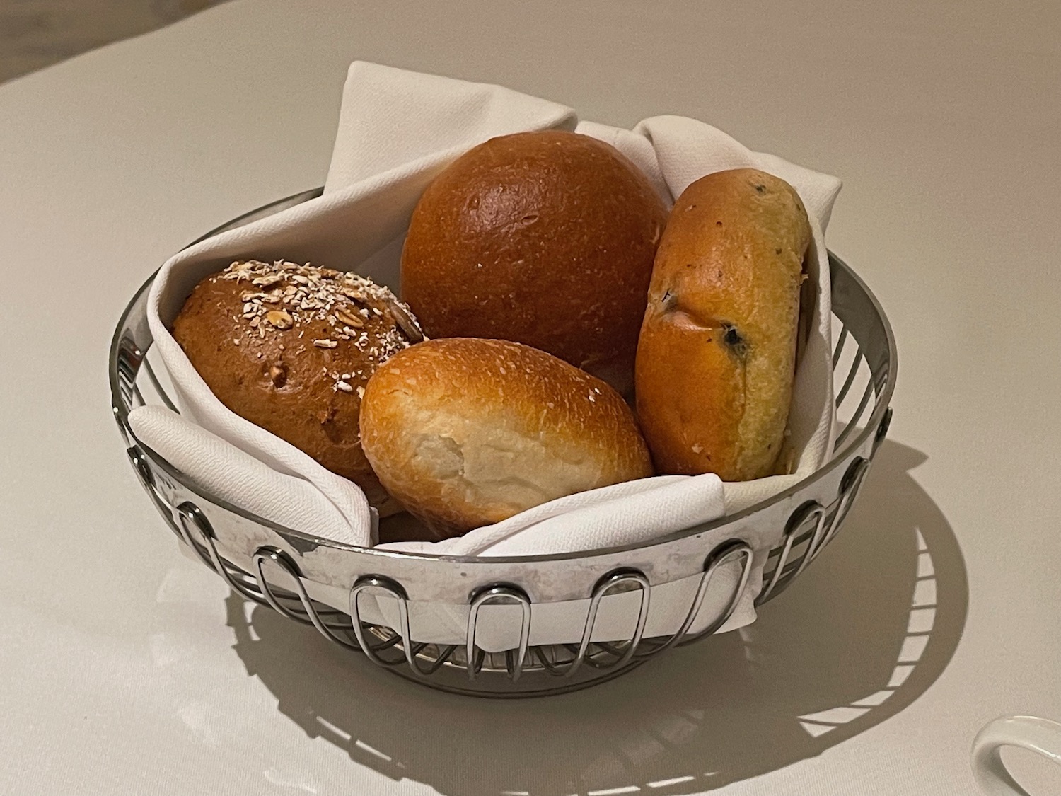 a basket of bread rolls