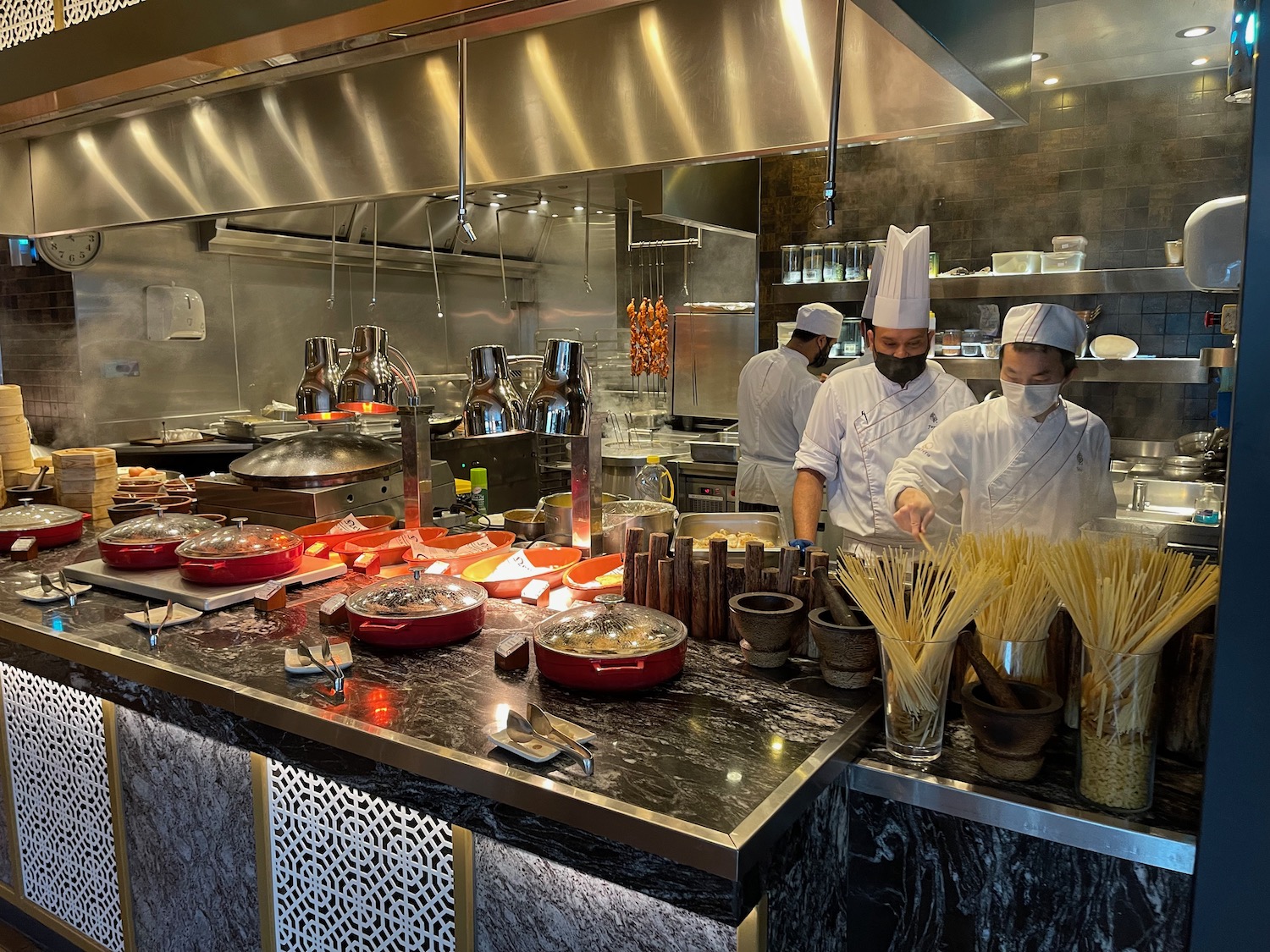 a group of chefs in a kitchen