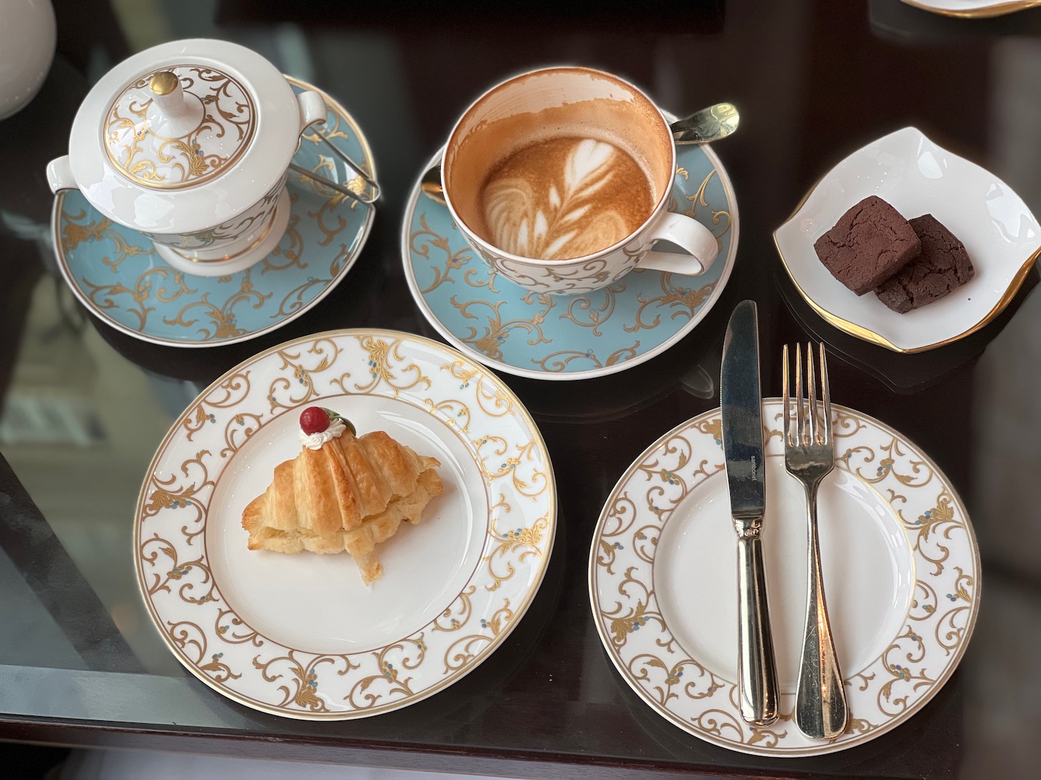 a table with plates and utensils