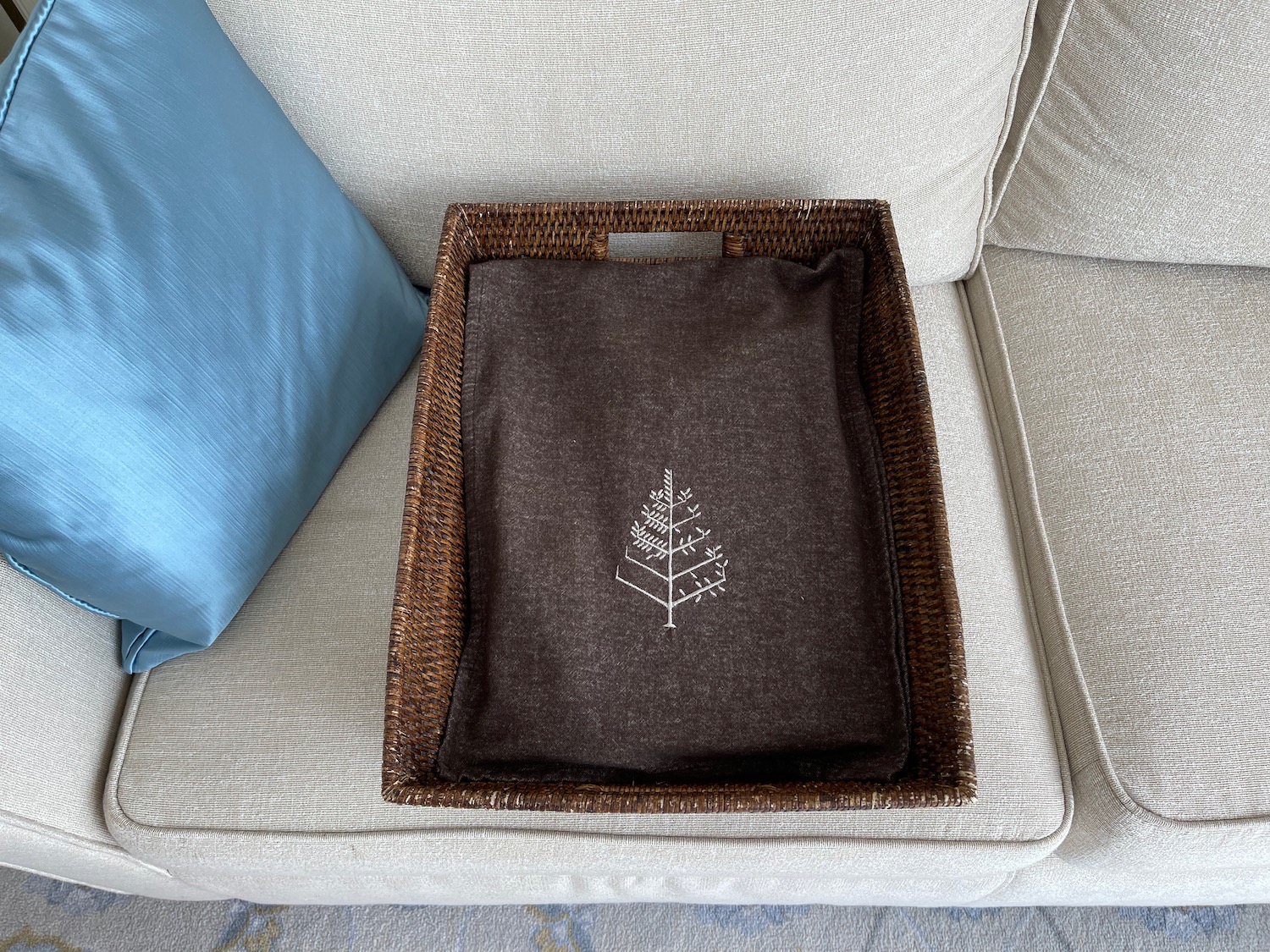 a basket with a brown cloth on it