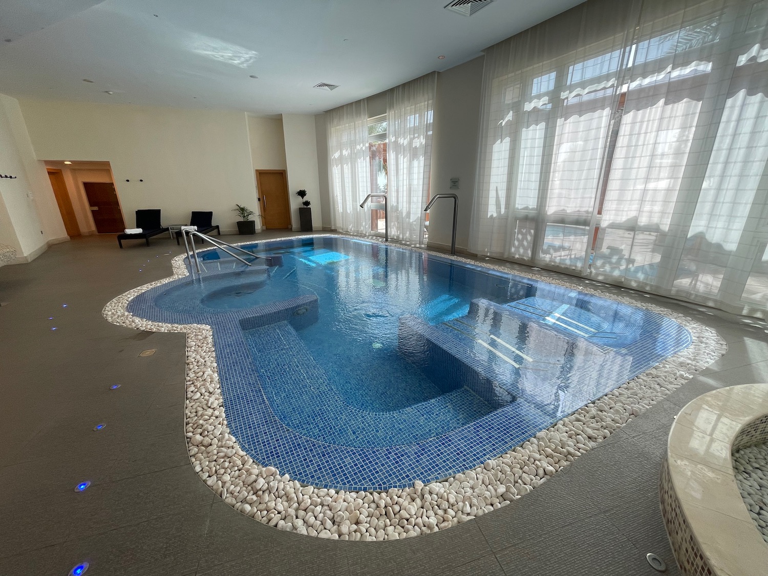a swimming pool inside a room