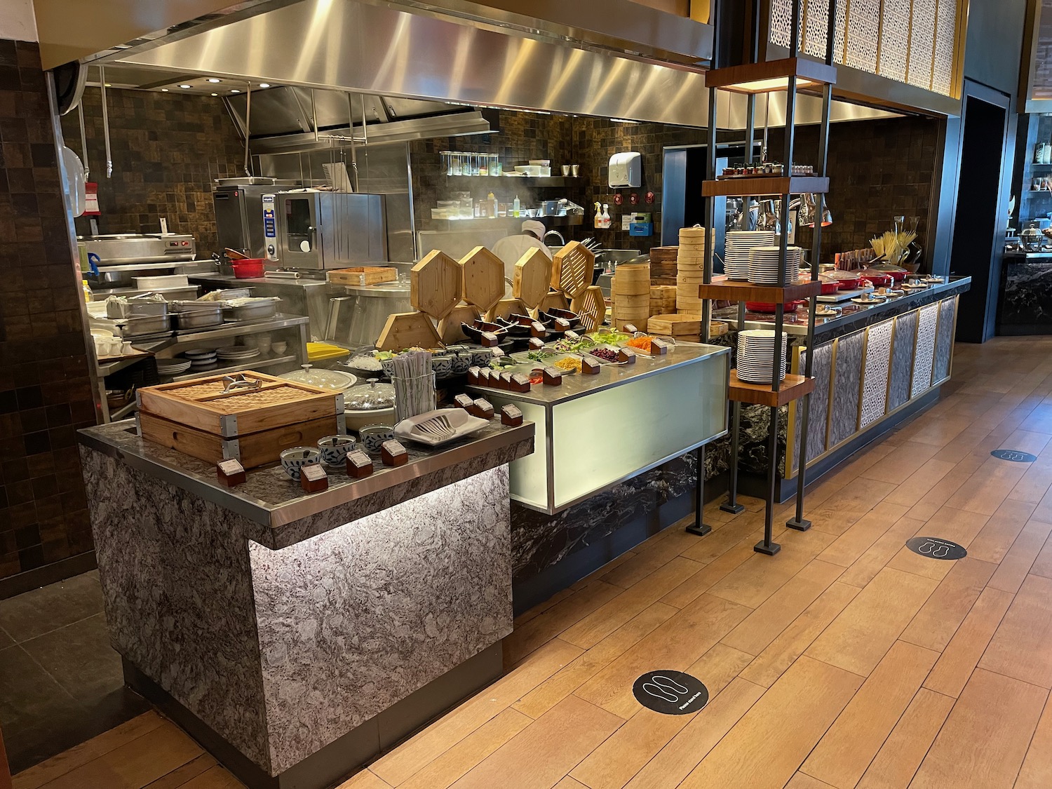 a kitchen with a counter and a wood floor