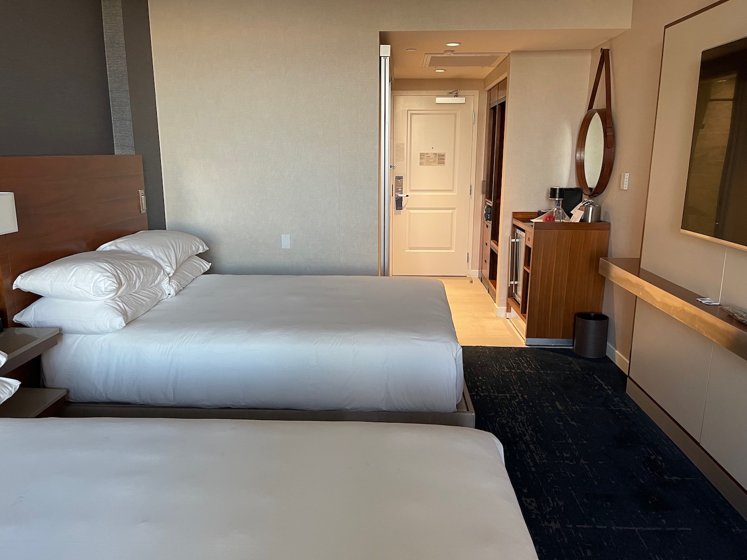 a hotel room with two beds