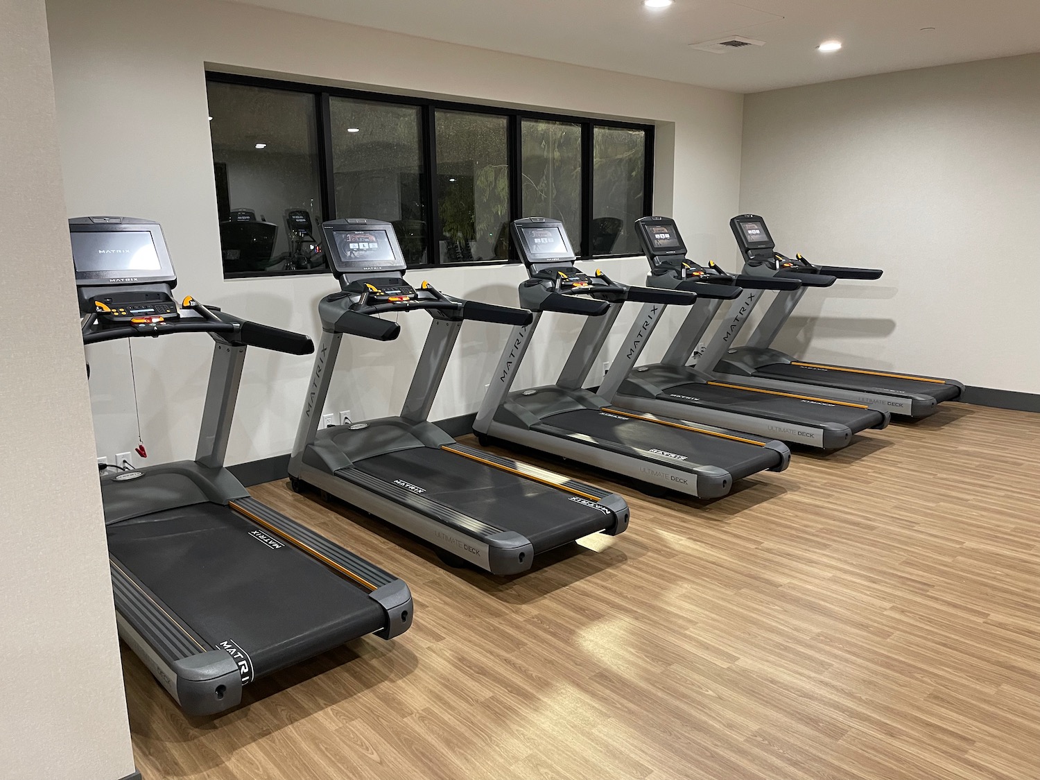 a group of treadmills in a room