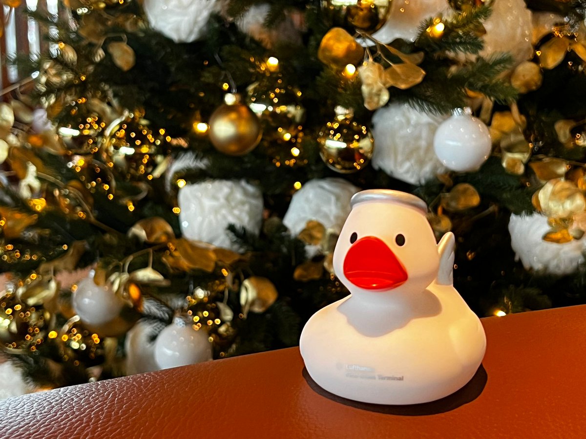 a white rubber duck on a table