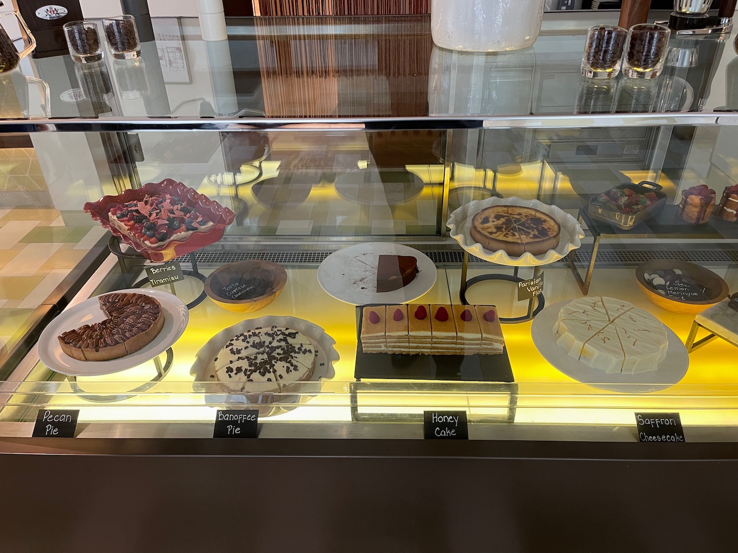 a display case with different desserts