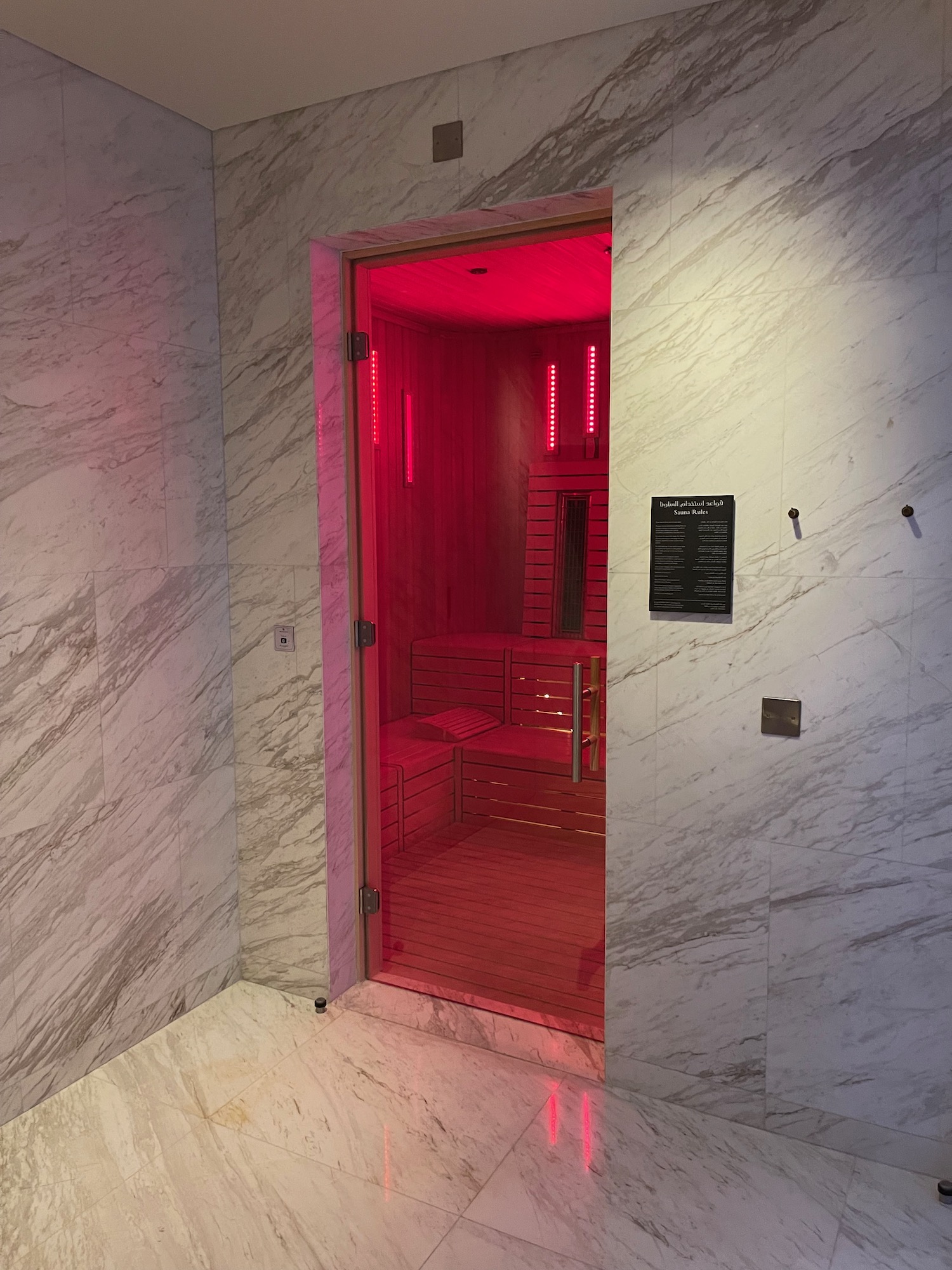 a door with red lights inside a room