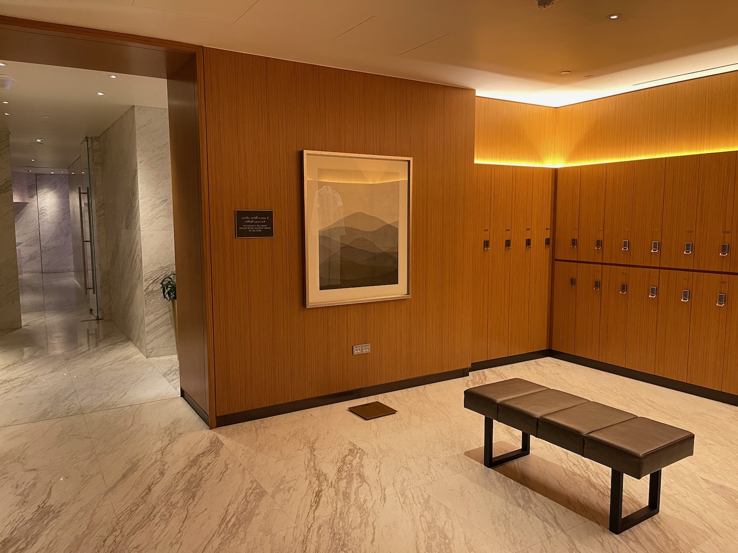 a room with lockers and a bench