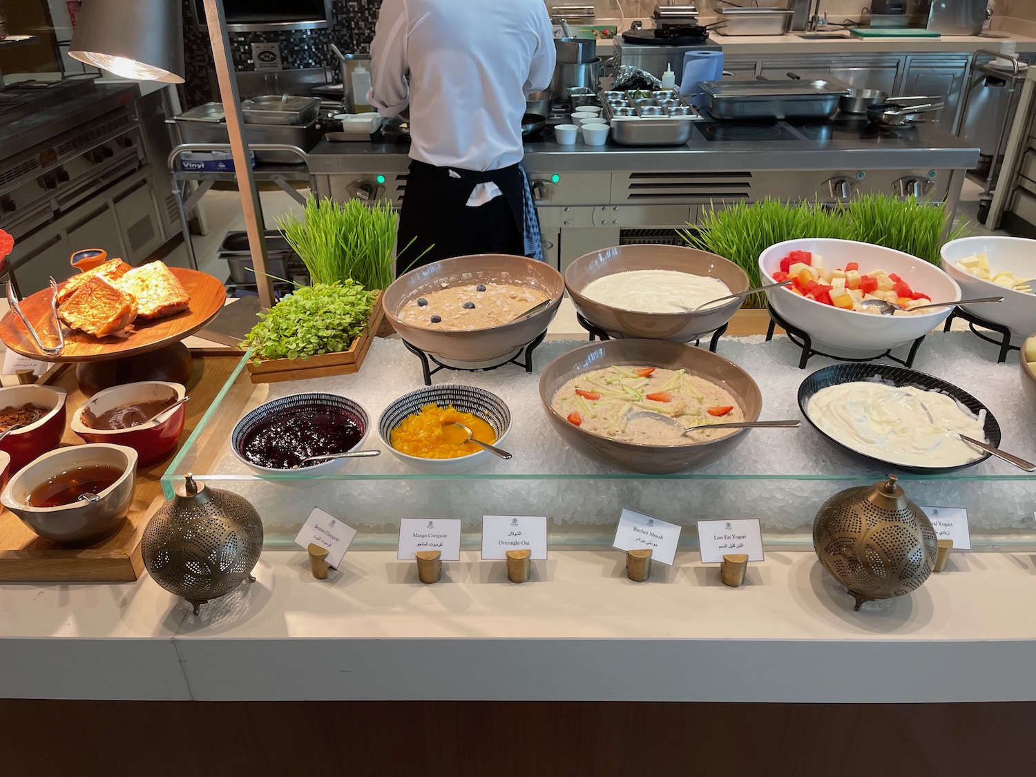 a buffet with different food items on it