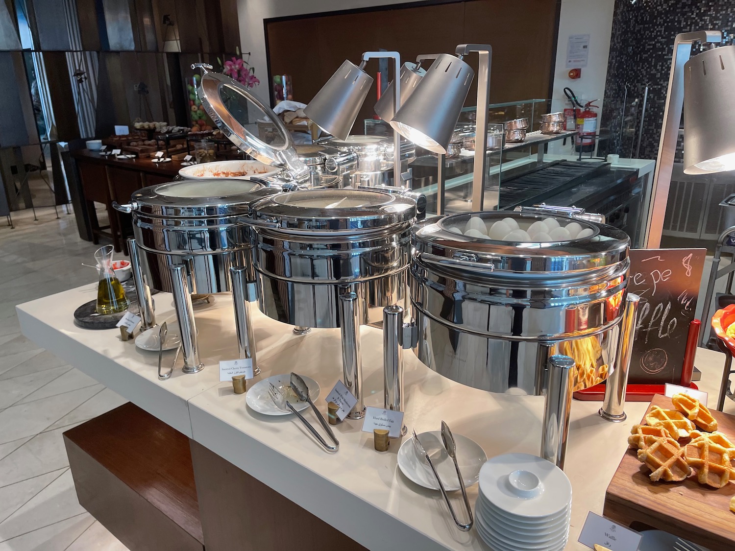 a buffet table with food containers
