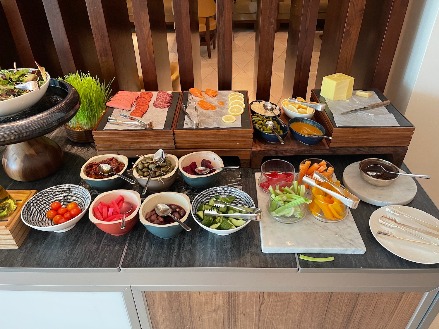 a buffet table with different food items on it