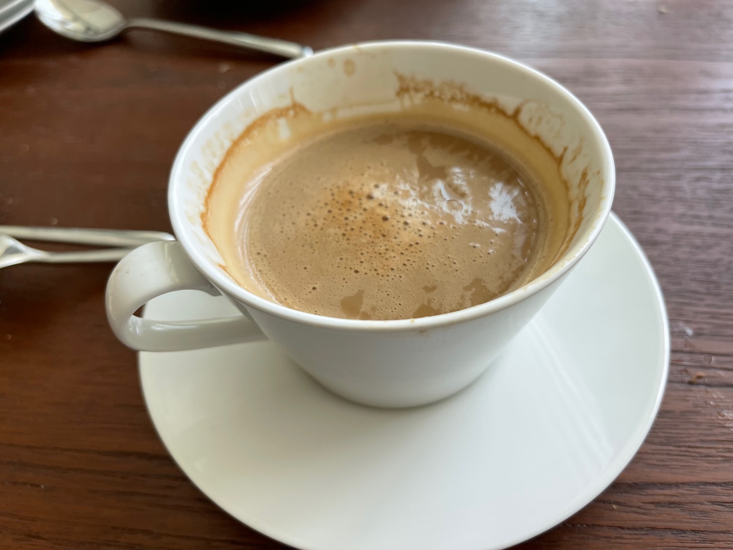 a cup of coffee on a saucer