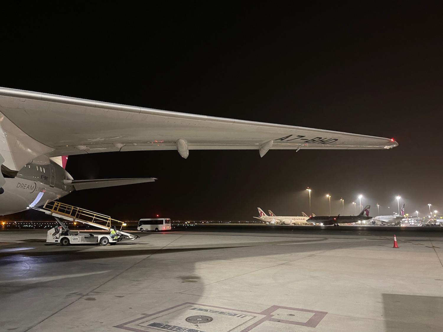 an airplane on the runway at night