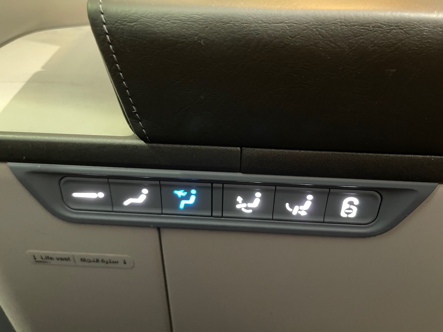 a seat controls with lights and seats in the back