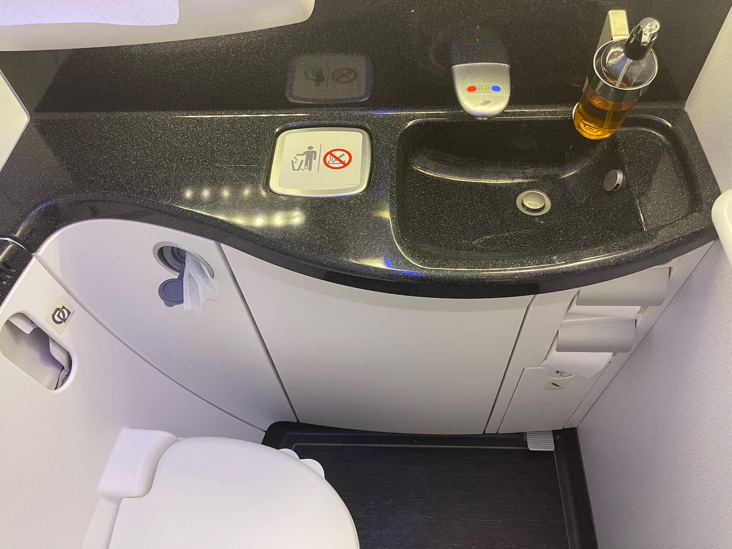 a sink and toilet in a bathroom