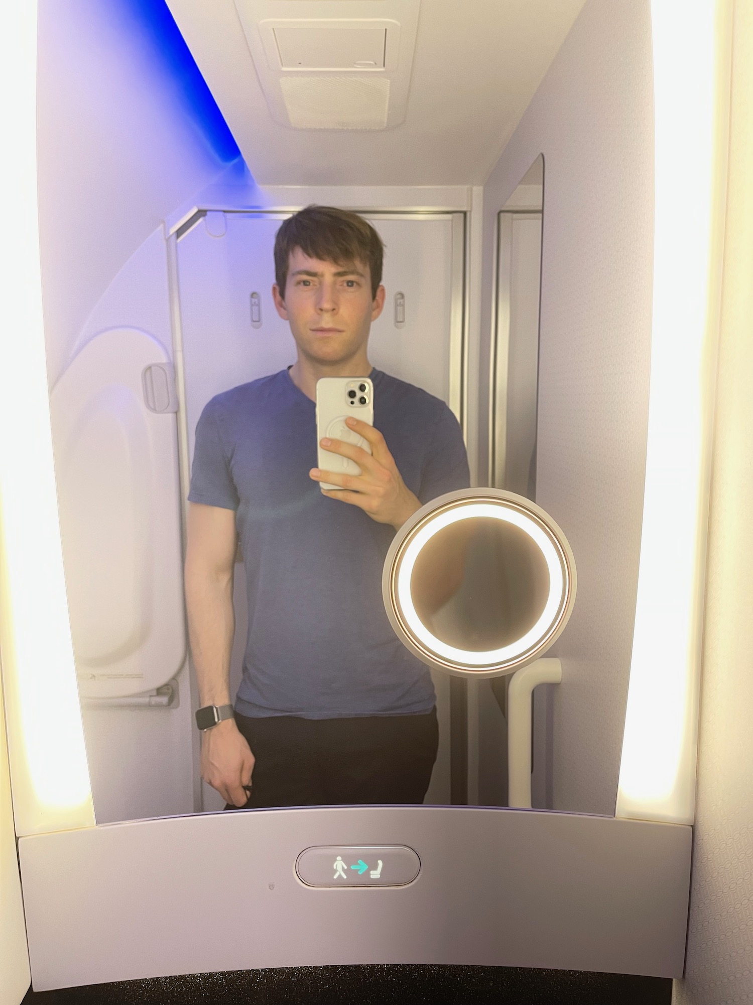 a man taking a selfie in a mirror