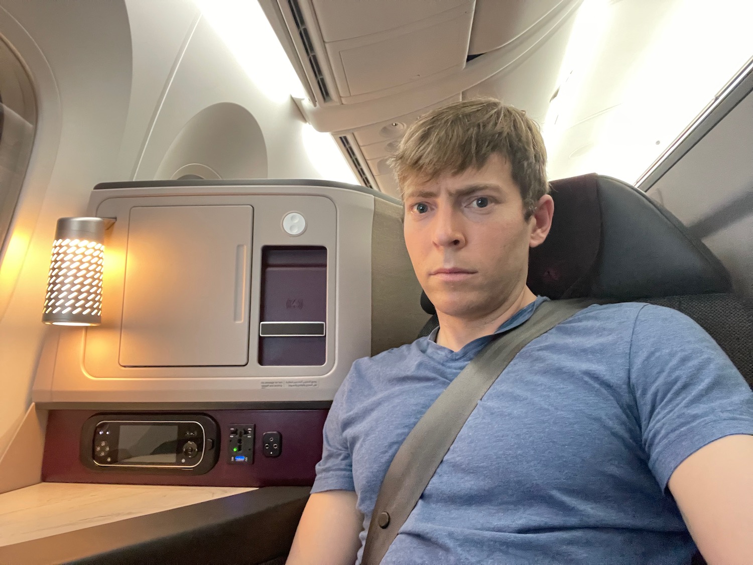 a man sitting in an airplane seat