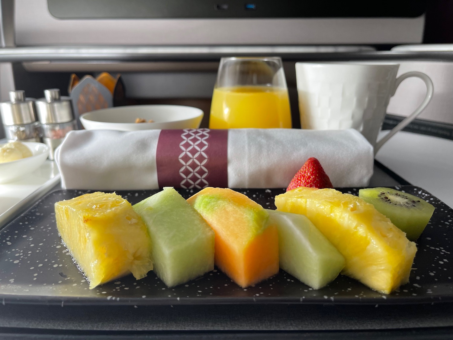 a plate of fruit on a table