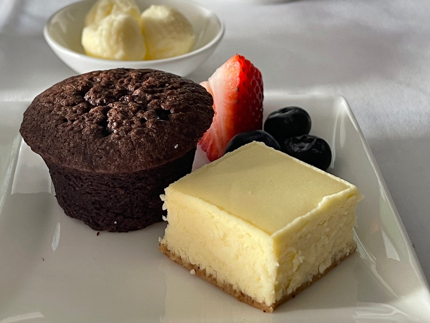 a plate of desserts on a table