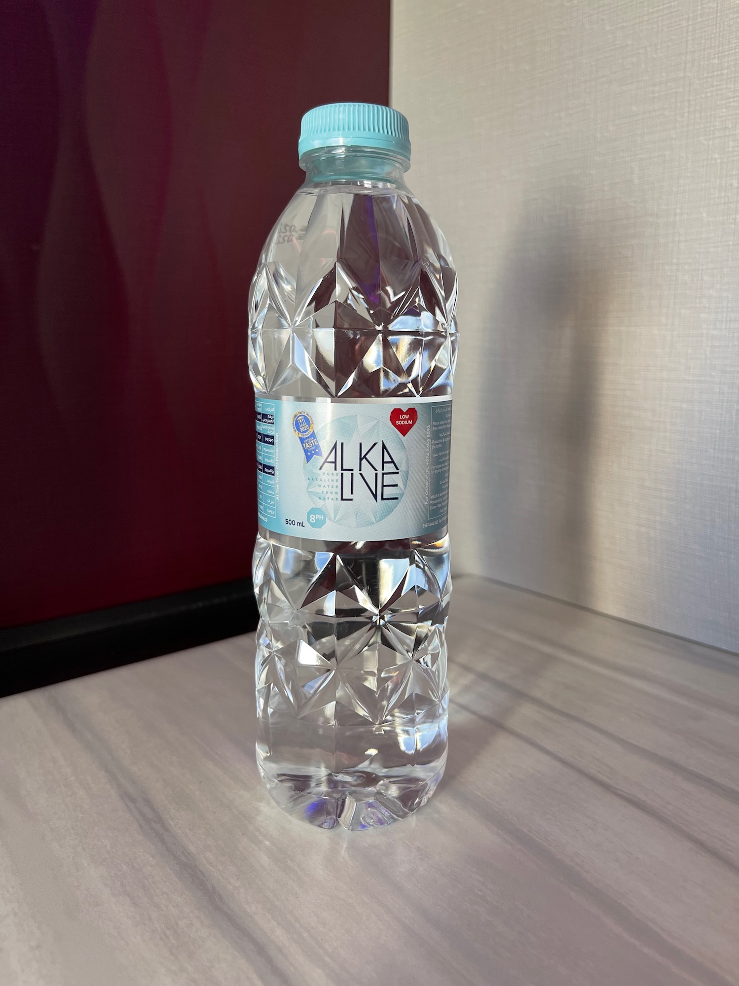 a bottle of water on a table