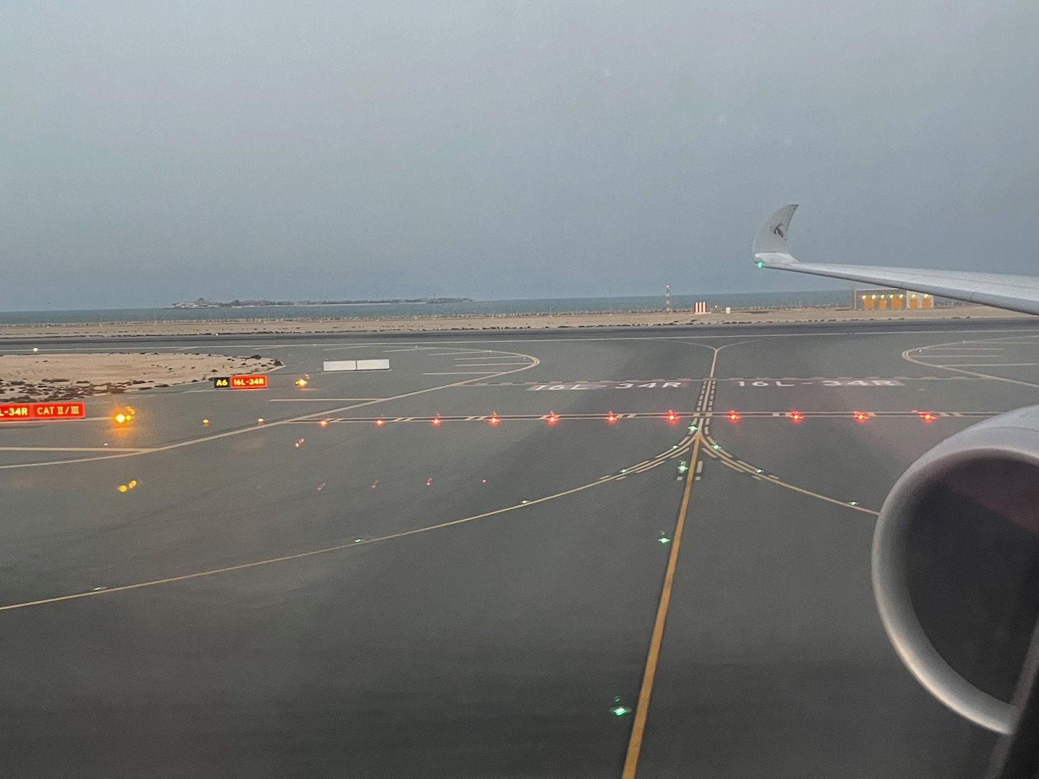 an airplane wing on a runway