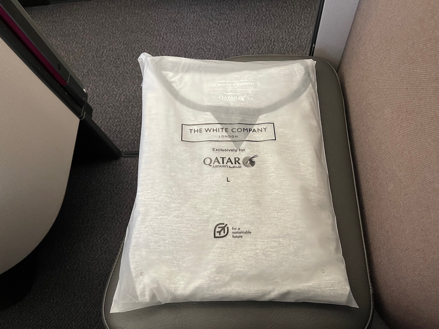 a white plastic bag on a seat