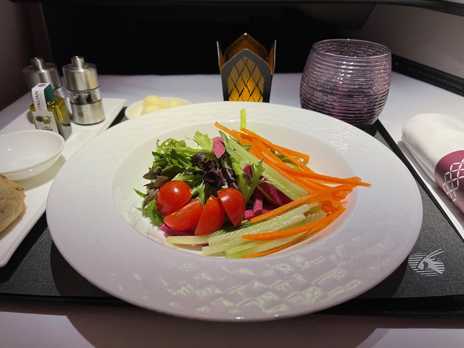 a plate of salad on a table