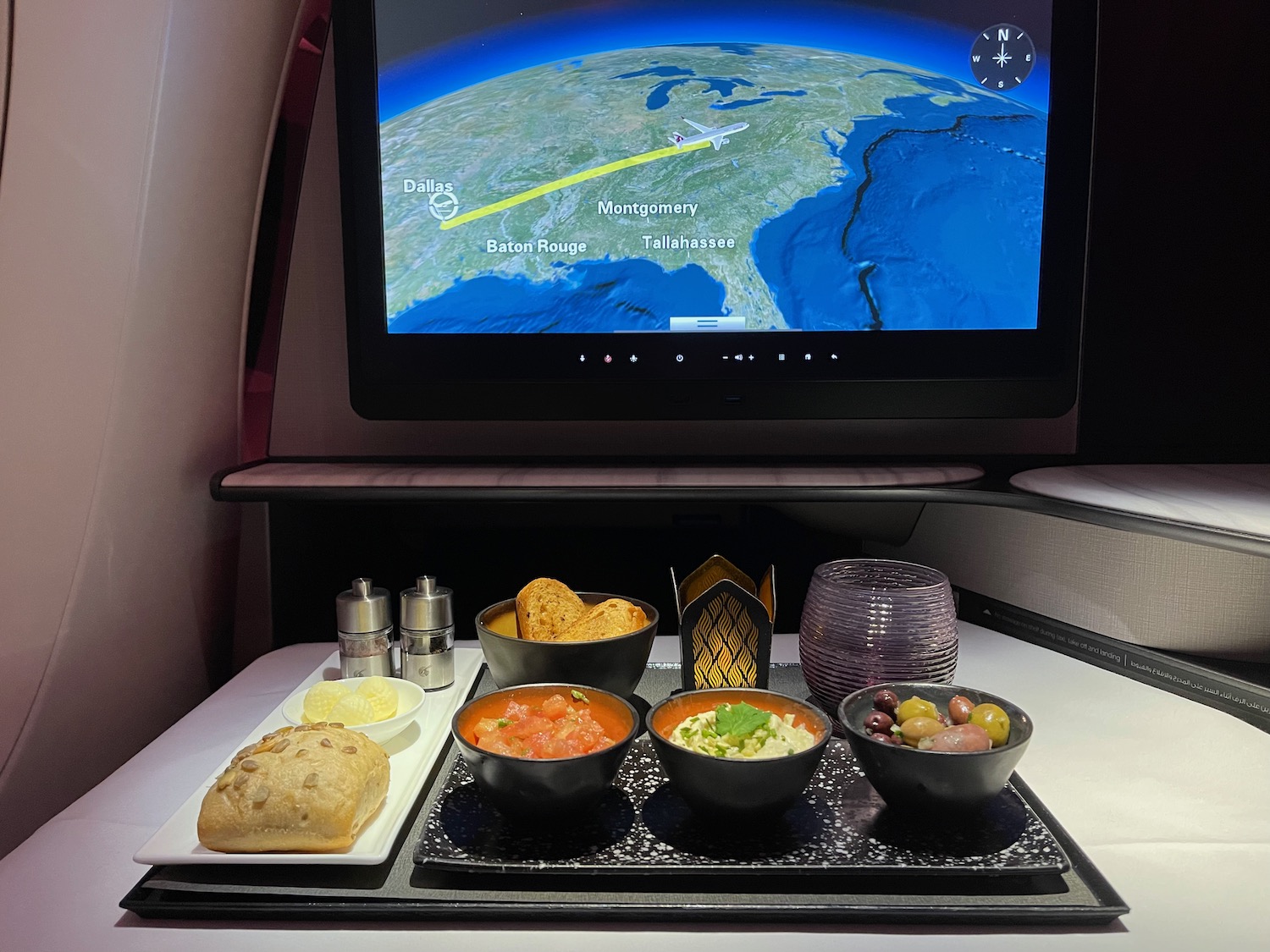 a tv on a tray with food on it