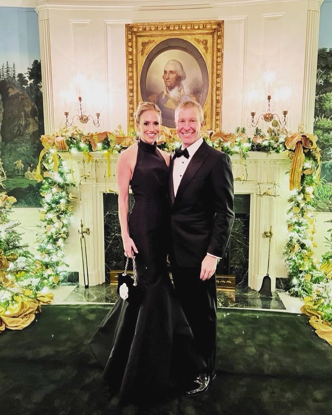 a man and woman in formal wear