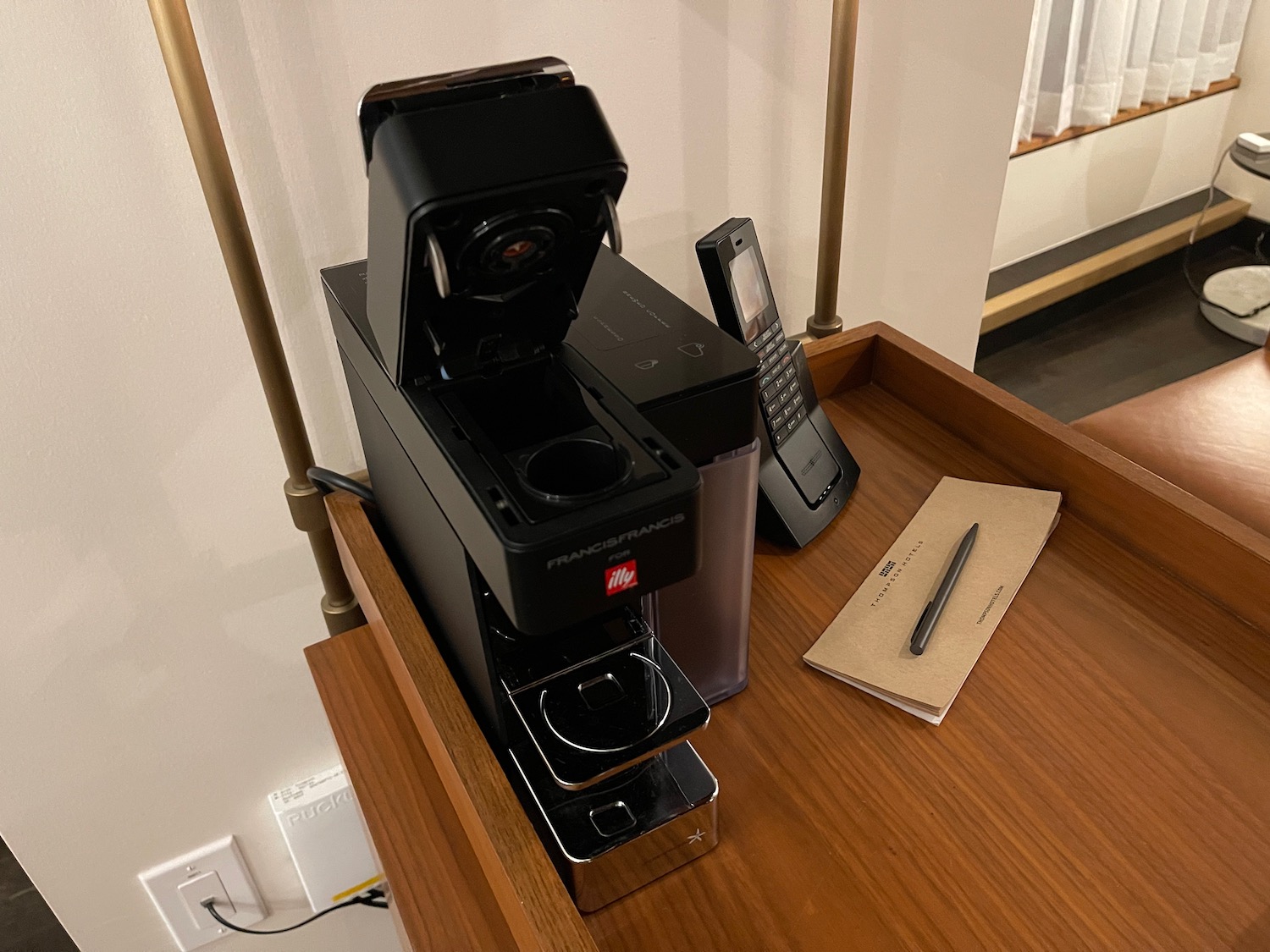 a coffee machine on a tray