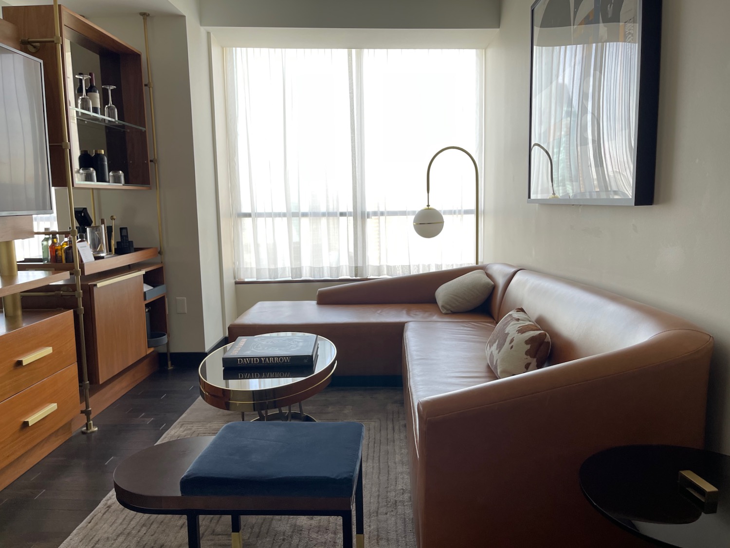 a living room with a couch and a table