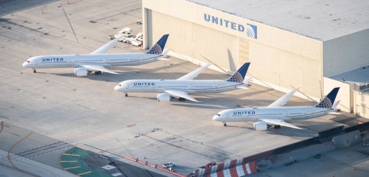 airplanes parked at an airport