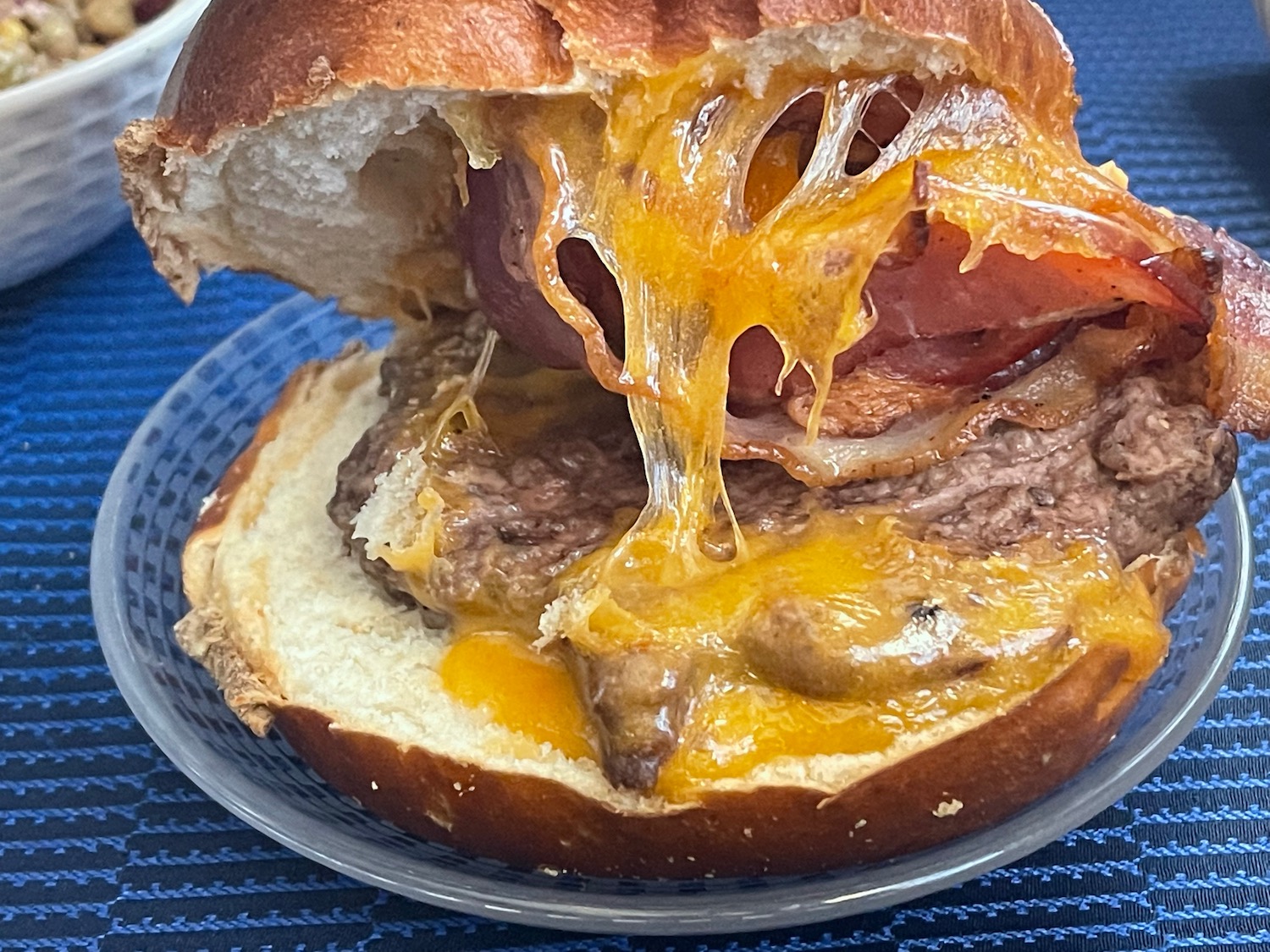 a cheeseburger on a plate