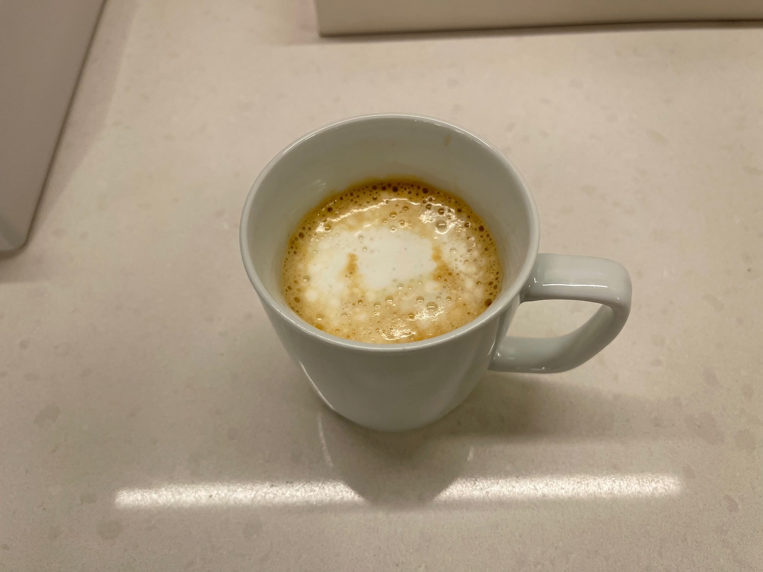 a cup of coffee on a counter