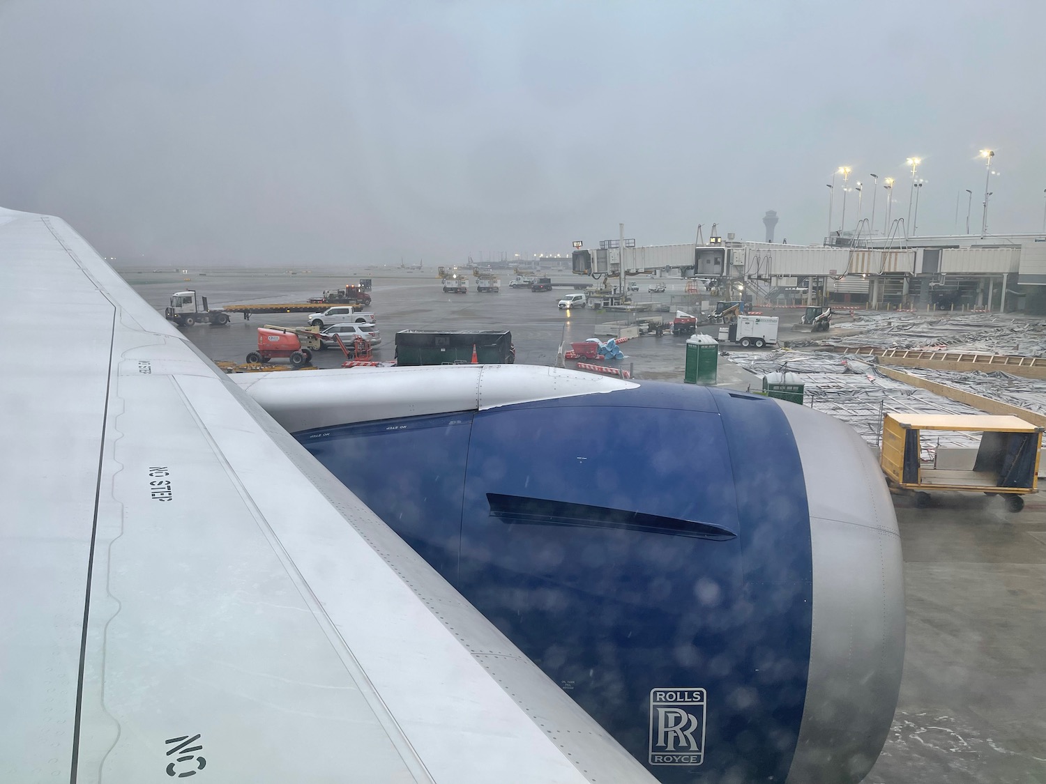 an airplane wing with a blue and white engine