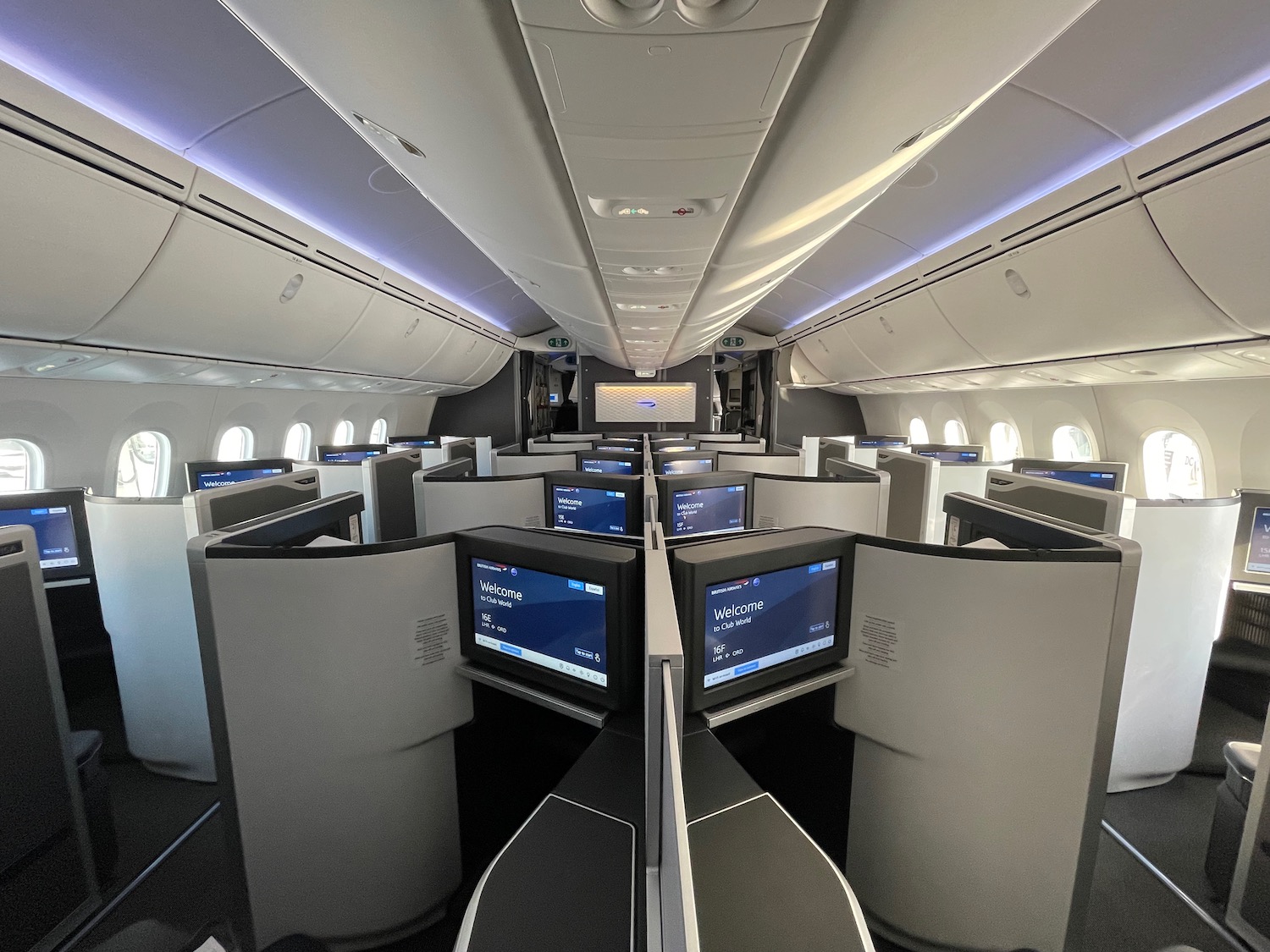 a row of computers in an airplane