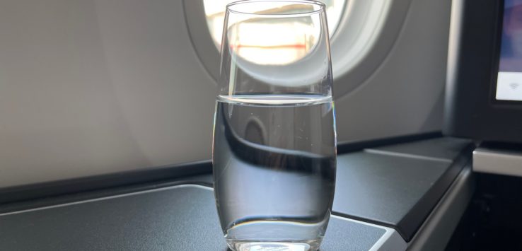 a glass of water on a table