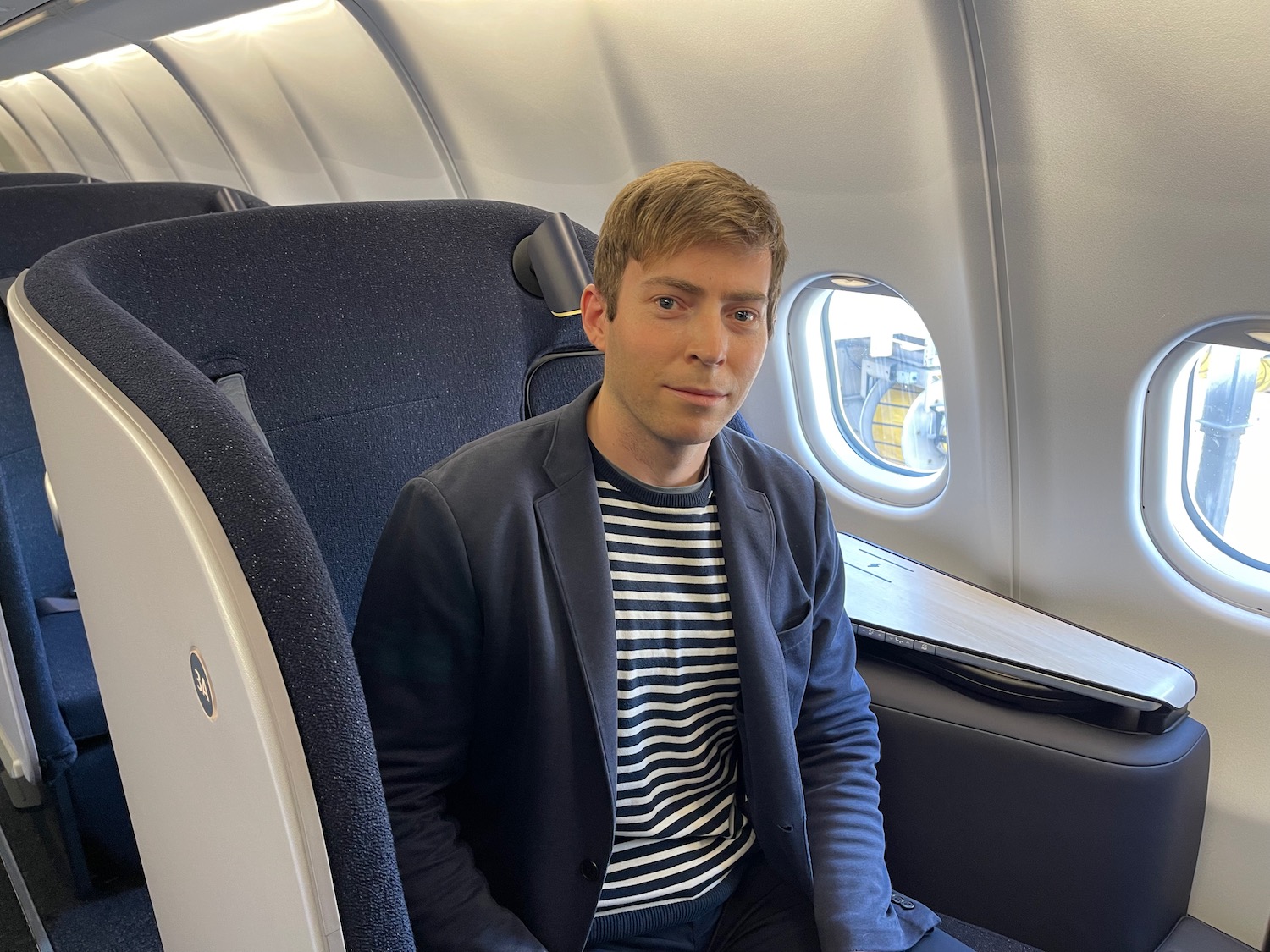 a man sitting in an airplane