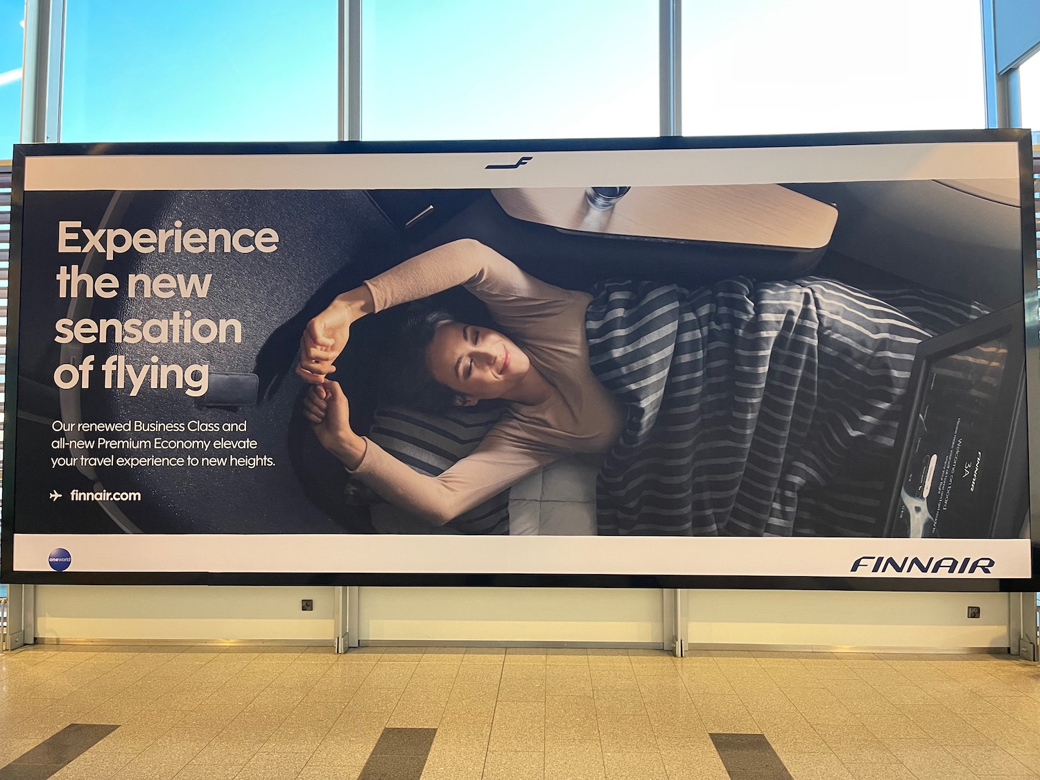 a billboard with a woman lying on her back